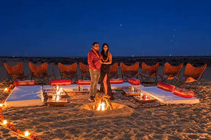 Private dinner setup among the sand dunes near Jaisalmer