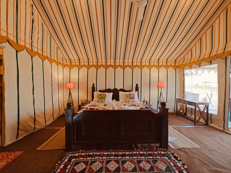 Spacious interior of the Luxury Swiss Tent near Sam Sand Dunes