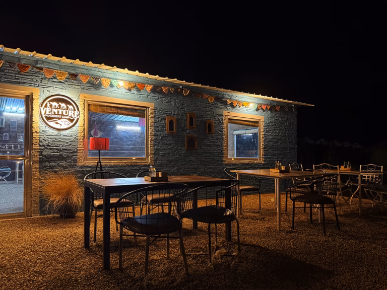Outdoor dining area at Venture Desert Camp in Jaisalmer