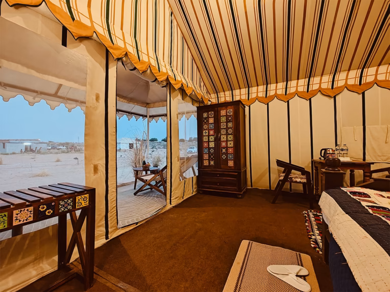 Indoor seating area beside the entrance of the Luxury Swiss Tent
