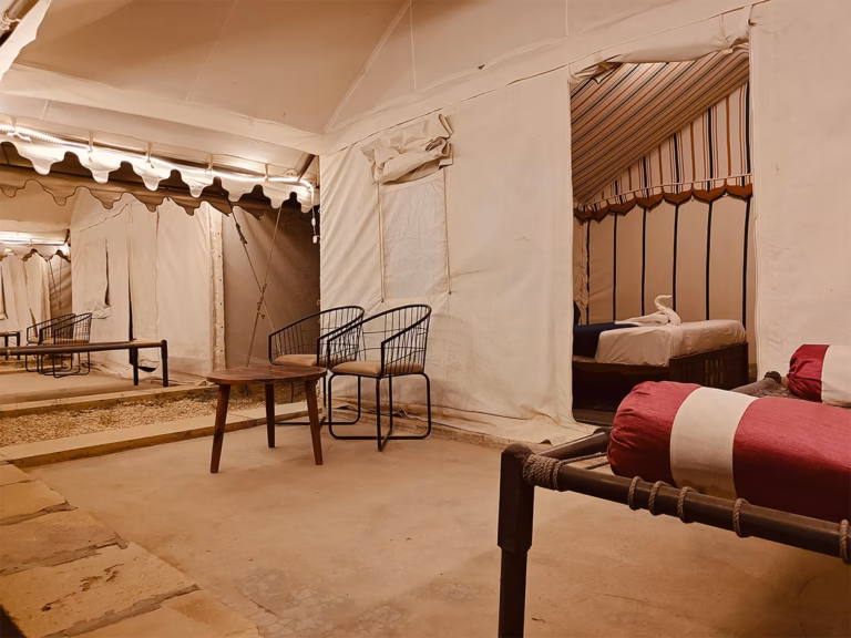 View from inside the Deluxe Swiss Tent towards the outdoor seating area