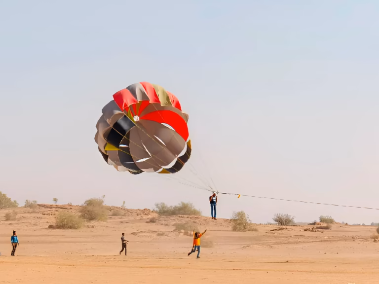 Parasailing above the desert near Damodra in Jaisalmer