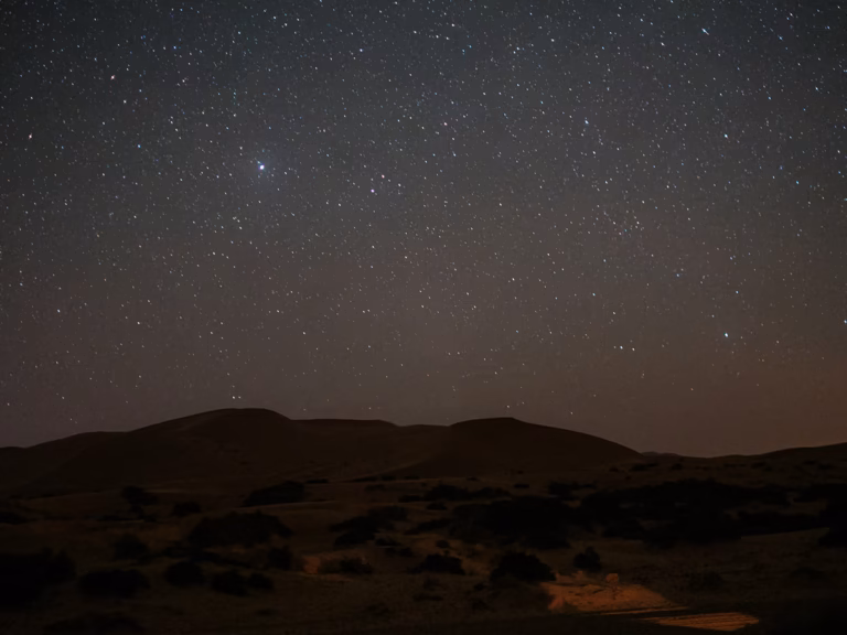 Stargazing under the clear night sky of the Thar Desert near Jaisalmer